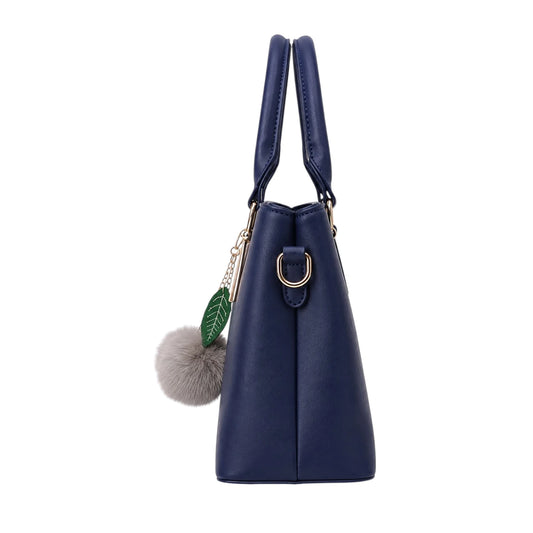 Torcz Navy Leather Carry Bag With Pom Charm Accent